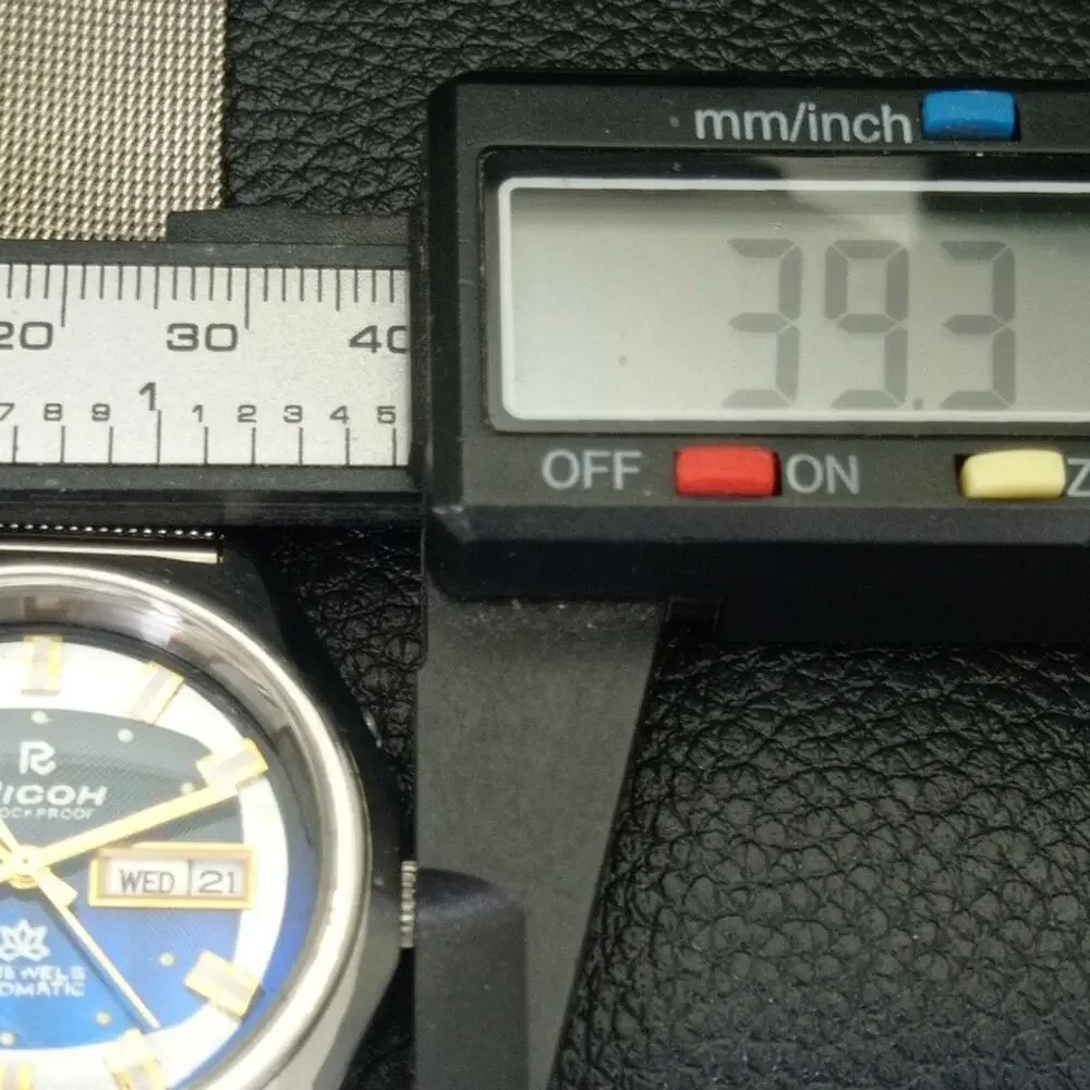 Vintage 1986 Ricoh Automatic Mens Silver Watch W/daydate & Blue accents